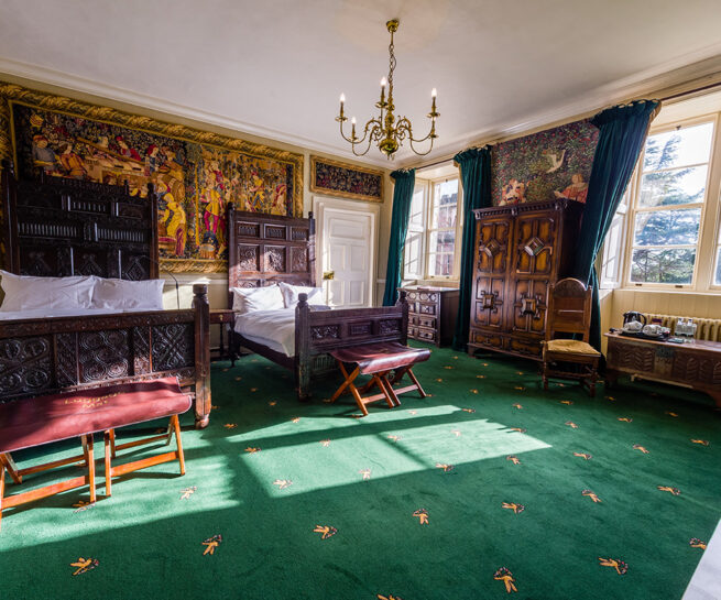 Antique twin beds and furnishings in the Tufton bedroom at Appleby Castle