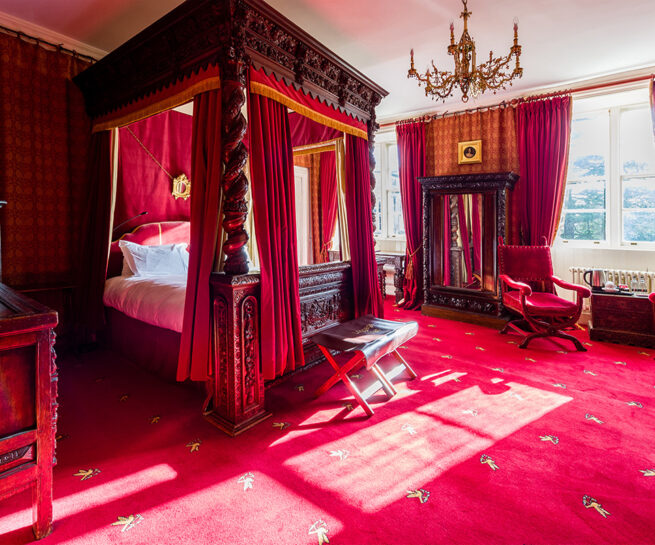 Antiques and four poster bed in the Clifford bedroom at Appleby Castle