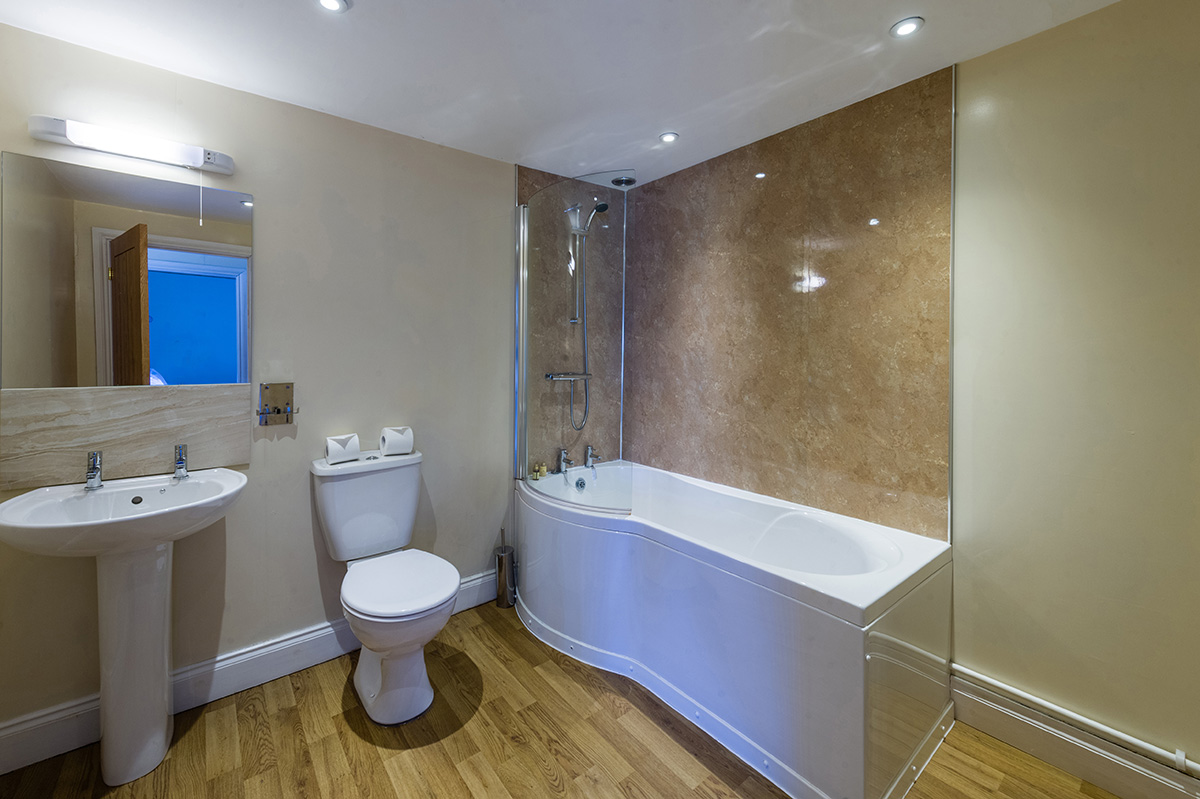The spacious bathroom in the self-contained holiday cottage at Appleby Castle