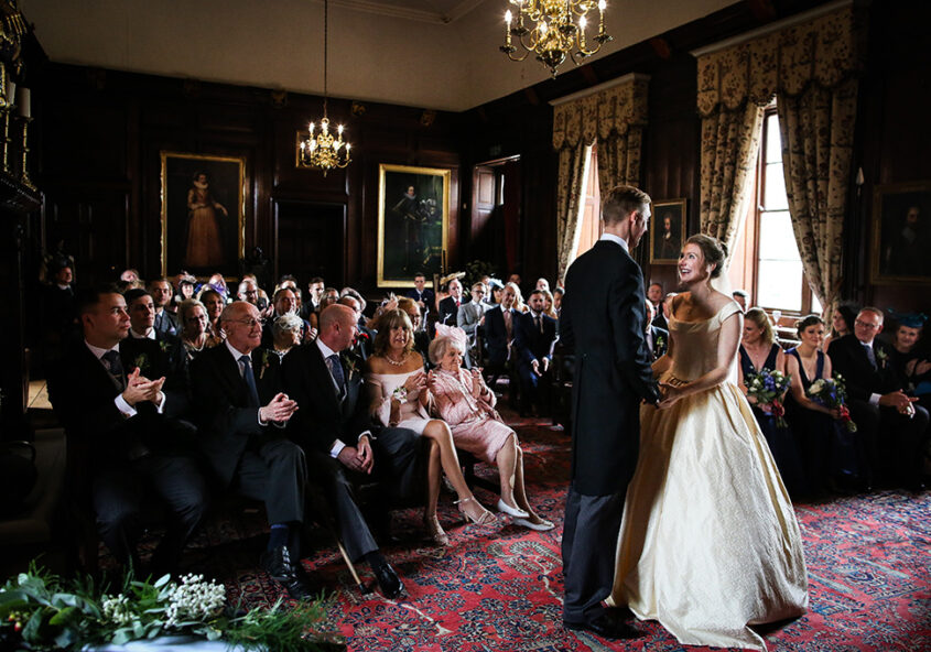 Bride, groom and family enjoy their wedding at Appleby Castle in Cumbria